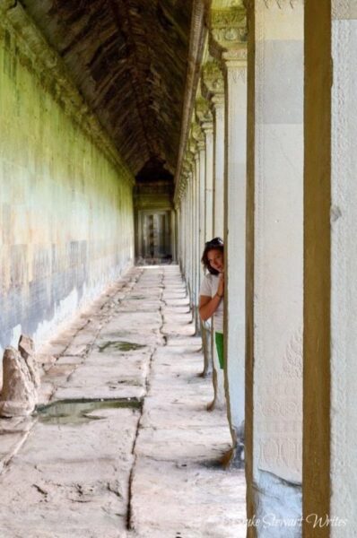 Christina Inside Angkor Wat exterior wall