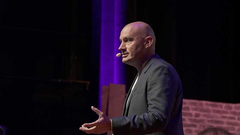 Scott Eddy Speaking at a Conference