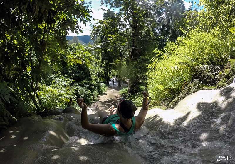 Acting Like a Waterslide at Bua Thong Sticky Waterfalls Thailand
